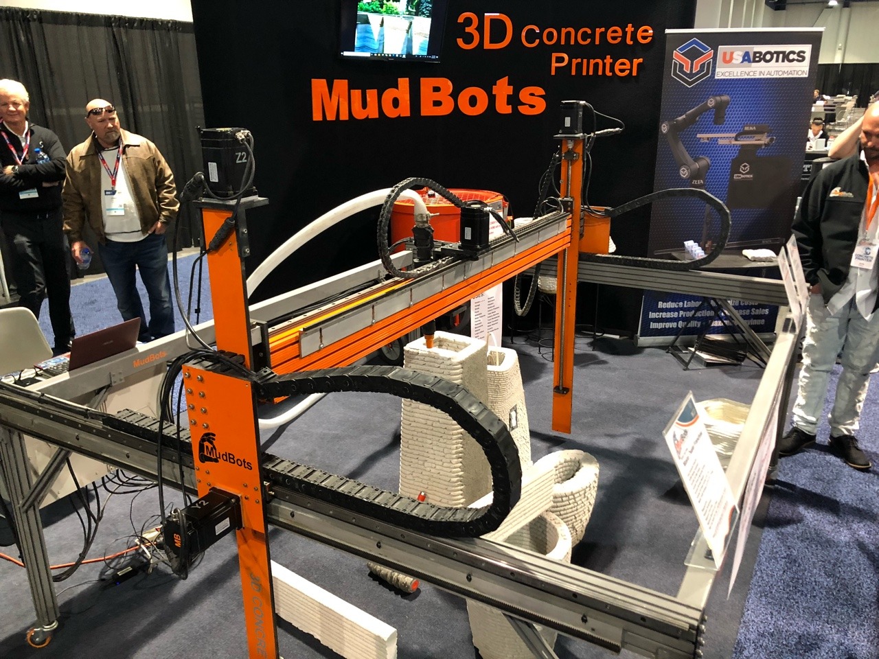 The company, MudBots 3D Concrete Printing, prints houses, bridges, pillars, statues, “fences,” water features, signage, and planters. The future is here.