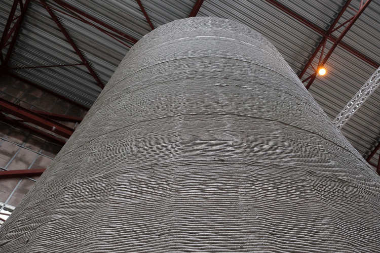 The latest target in a LafargeHolcim investigation of 3D-printed concrete elements or structures is a pedestal for a new class of turbines, 150-200 meters high, that have the potential to harness one-third or more energy than the shorter towers dotting wind farms the world over.