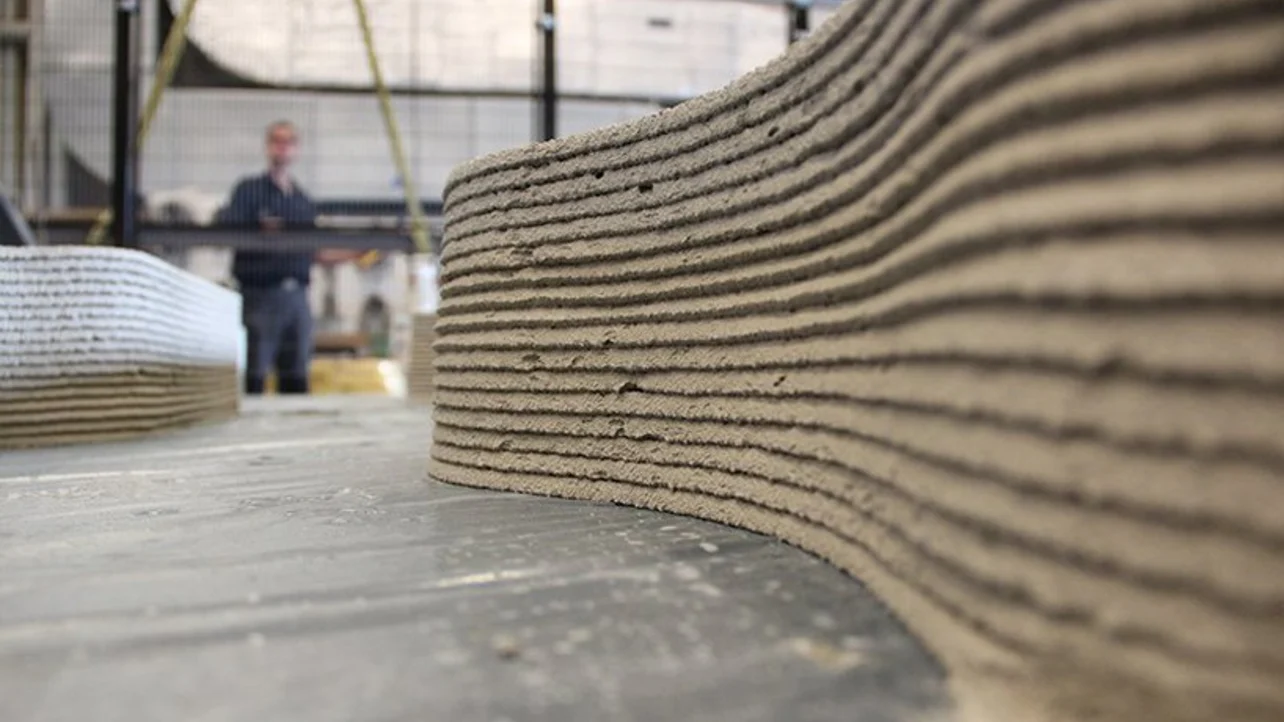 Concrete 3D printing is the shiny new tool in the toolbox of architects and construction companies. It offers a quick and cost-efficient way of building homes. Here is an introduction explaining how concrete 3D printing works, different concrete 3D printing applications, and what the benefits and limitations are.